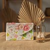 2822dfd0-a6b6-4e68-8b81-43558d5aead8 Ivory Bloom Handcrafted Floral Beaded Clutch