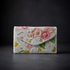 602ac1d1-dc1b-4455-aa12-a7dea2751adf Ivory Bloom Handcrafted Floral Beaded Clutch