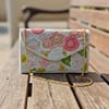 ce4c0219-57f6-442a-a63a-fe4a9b2803f3 Ivory Bloom Handcrafted Floral Beaded Clutch