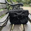 6514b890-fa46-4533-87e0-e2ed7b023731 The Luxury Heirloom Bow Clutch