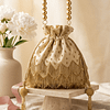 pomelli_photoshoot_image_9_16_0422 (6) - Copy - Copy Golden Pearl Handle Potli Bag