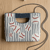 pomelli_photoshoot_image_9_16_0430 Vintage Baseball Beaded Mini Clutch Bag