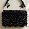 Midnight Fringe Glam Clutch