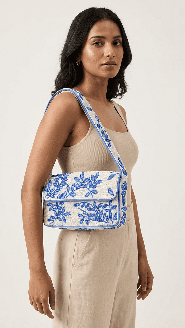 pomelli_photoshoot_image_9_16_0420 (1) Blue Bloom Shoulder Bag