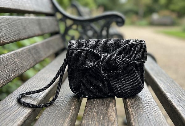 6514b890-fa46-4533-87e0-e2ed7b023731 The Luxury Heirloom Bow Clutch